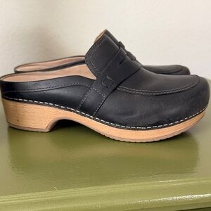 Dansko Black Leather Mules with Tan Sole